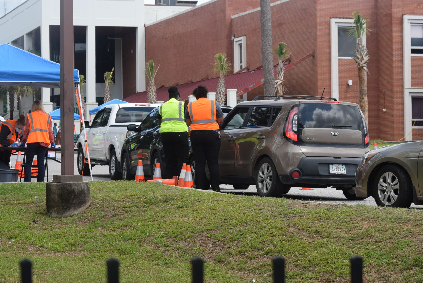 Workers Eau Claire High School Coronavirus Testing Drive Thru